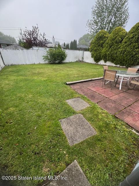 61 Morton Street Staten Island, NY 10306 - Photo 18 of 18 a view of a yard with an outdoor space