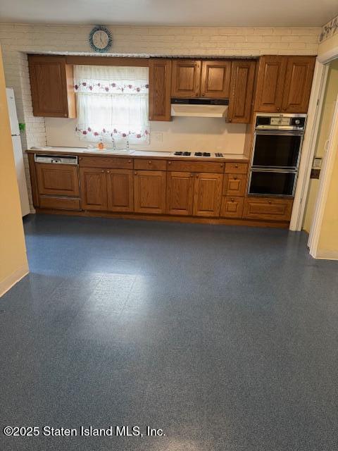 61 Morton Street Staten Island, NY 10306 - Photo 5 of 18 a kitchen with stainless steel appliances granite countertop a stove a sink and a refrigerator