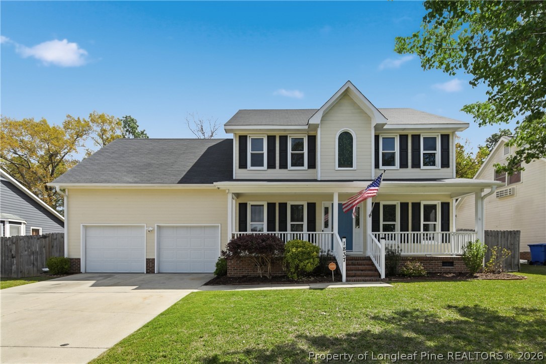 1837 Nuthatch Road Fayetteville, NC 28304 - Photo 1 of 43 a front view of a house with a yard