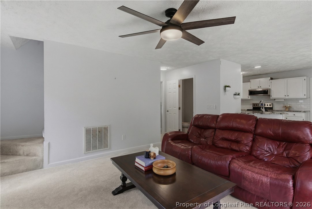 1837 Nuthatch Road Fayetteville, NC 28304 - Photo 12 of 43 a living room with furniture
