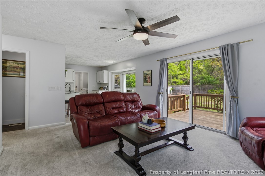 1837 Nuthatch Road Fayetteville, NC 28304 - Photo 13 of 43 a living room with furniture and a window