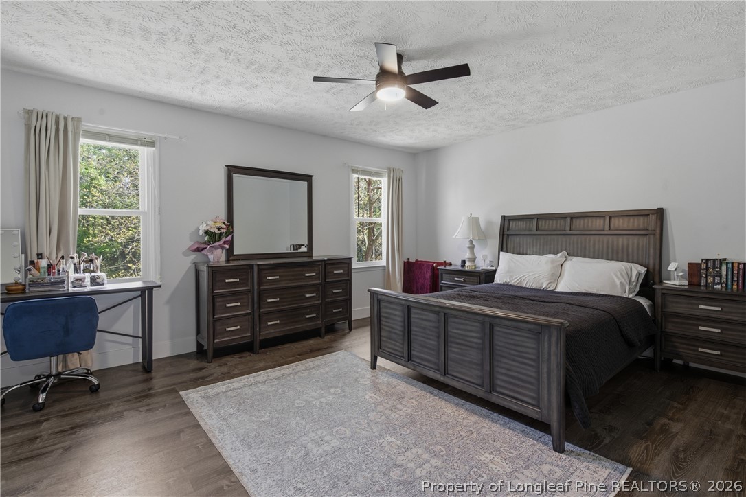 1837 Nuthatch Road Fayetteville, NC 28304 - Photo 24 of 43 a bedroom with a bed and a desk