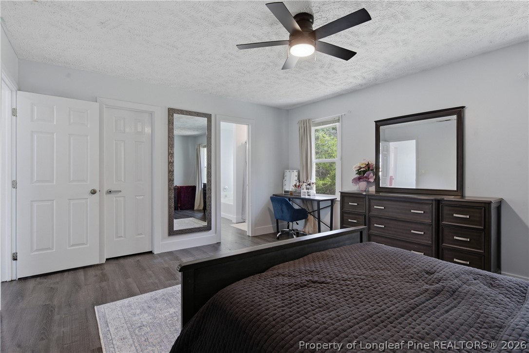 1837 Nuthatch Road Fayetteville, NC 28304 - Photo 25 of 43 a bedroom with a bed and a dresser