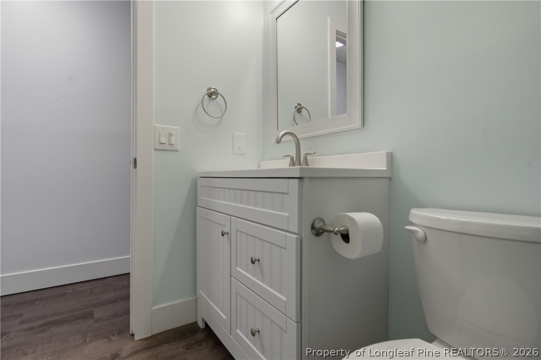 1837 Nuthatch Road Fayetteville, NC 28304 - Photo 38 of 43 a bathroom with a toilet