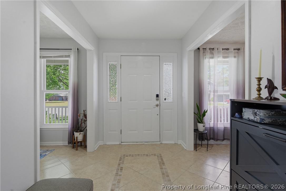 1837 Nuthatch Road Fayetteville, NC 28304 - Photo 6 of 43 a view of room with livingroom and furniture