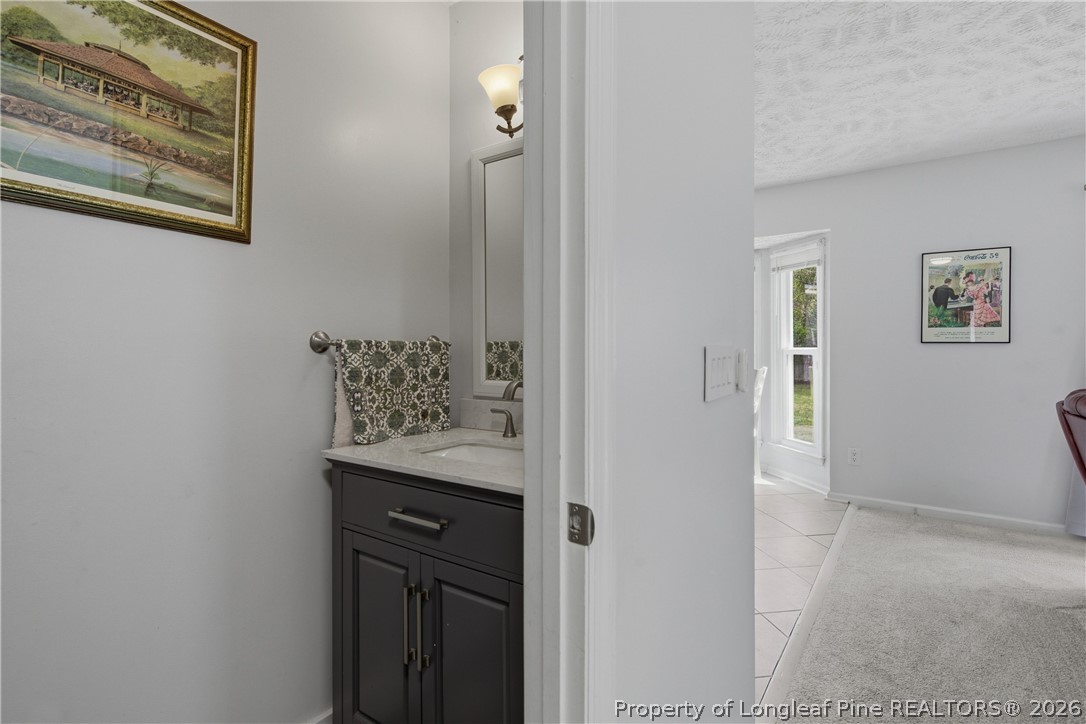 1837 Nuthatch Road Fayetteville, NC 28304 - Photo 10 of 43 a view of a hallway to rooms
