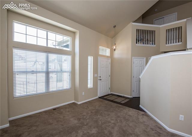 7945 Morning Dew Road Colorado Springs, CO 80908 - Photo 5 of 32 Large windows for a ton of natural light!