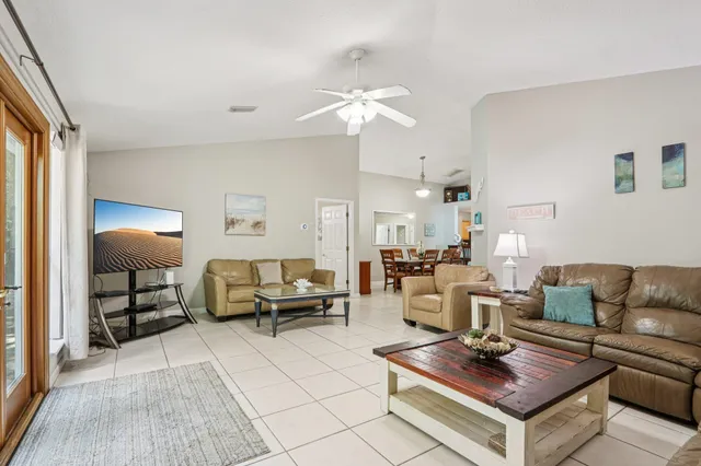 a living room with furniture and a couch