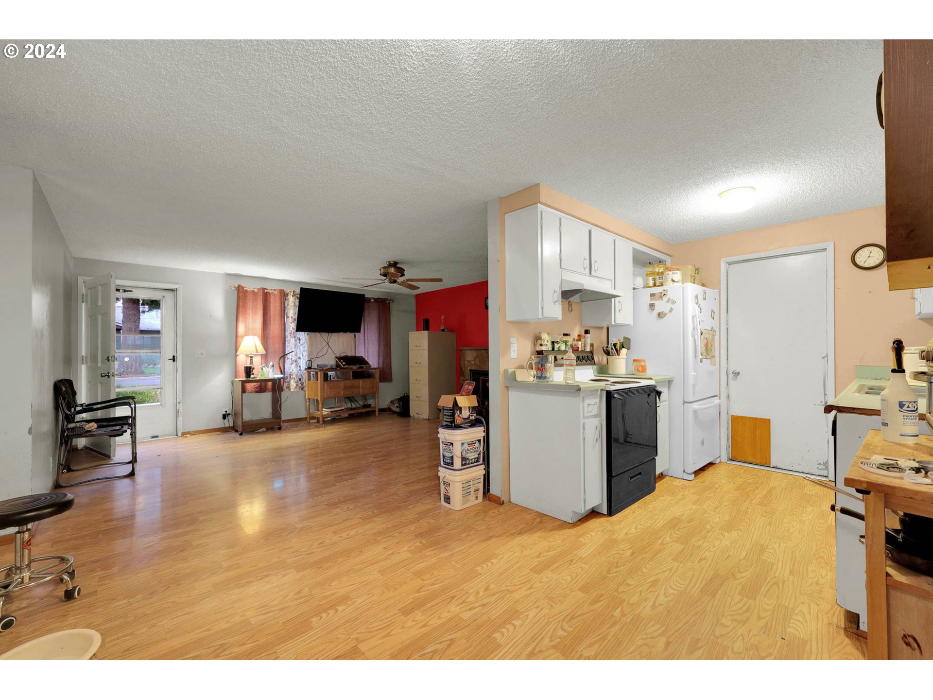 584 North 49th Street Springfield, OR 97478 - Photo 9 of 28 a kitchen with a refrigerator and a sink