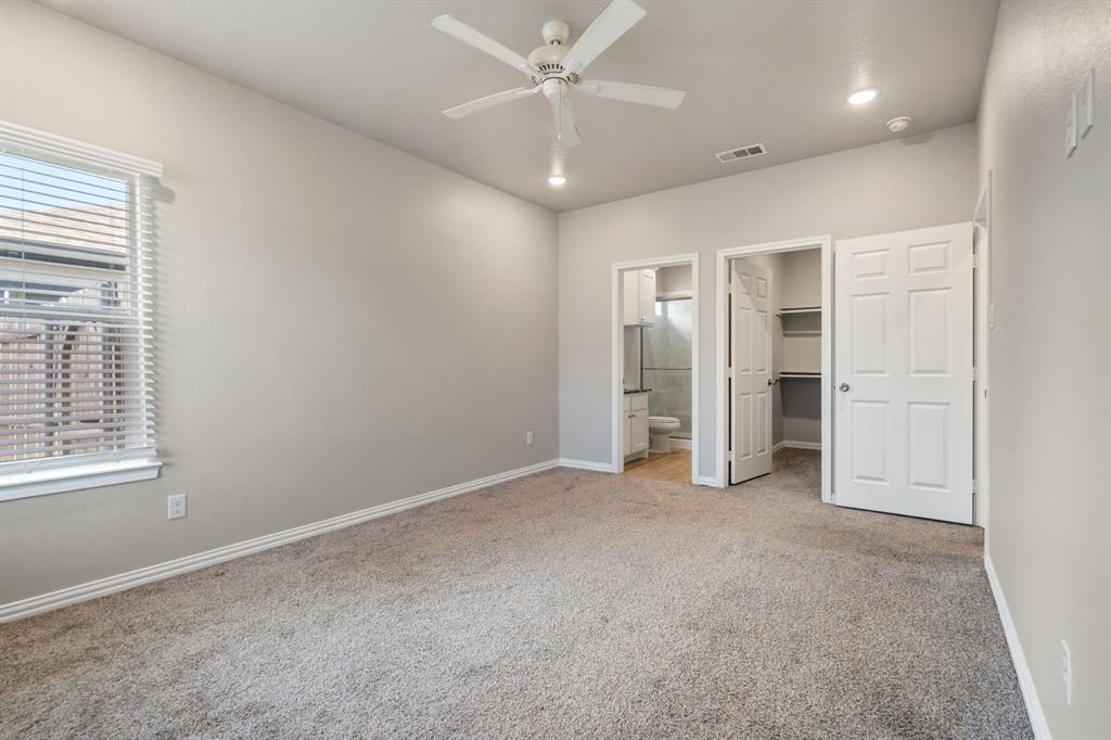 2306 Church Street Greenville, TX 75401 - Photo 13 of 24 an empty room with closet and windows