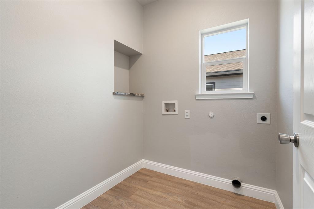 2306 Church Street Greenville, TX 75401 - Photo 20 of 24 a view of small space with wooden floor