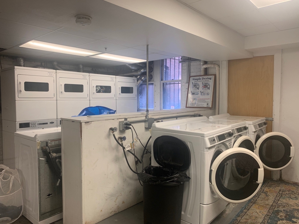 483 Beacon Street, Unit 26 Boston, MA 02115 - Photo 8 of 9 a utility room with dryer and washer