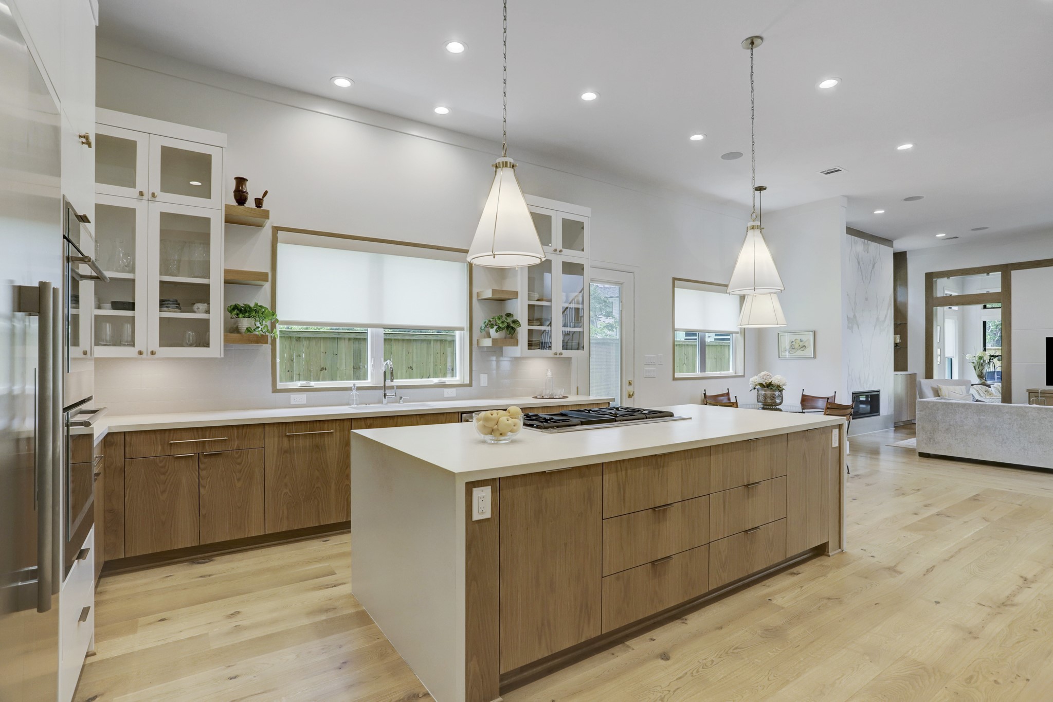739 Azaleadell Drive Houston, TX 77018 - Photo 13 of 49 a kitchen with stainless steel appliances granite countertop a sink a stove and a large window