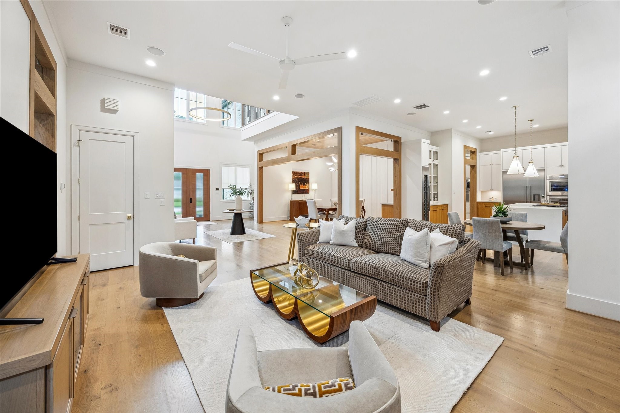 739 Azaleadell Drive Houston, TX 77018 - Photo 19 of 49 a living room with furniture and a flat screen tv