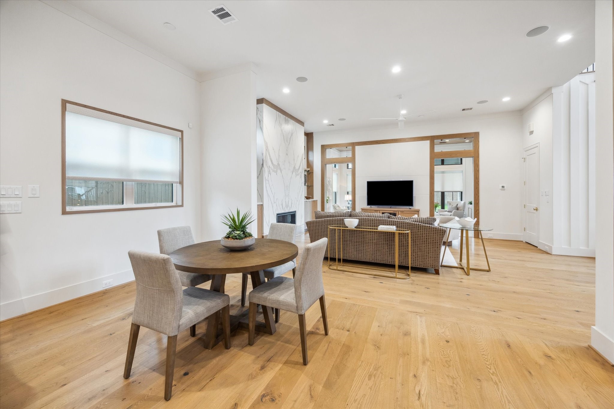 739 Azaleadell Drive Houston, TX 77018 - Photo 20 of 49 a living room with furniture a flat screen tv and a wooden floor
