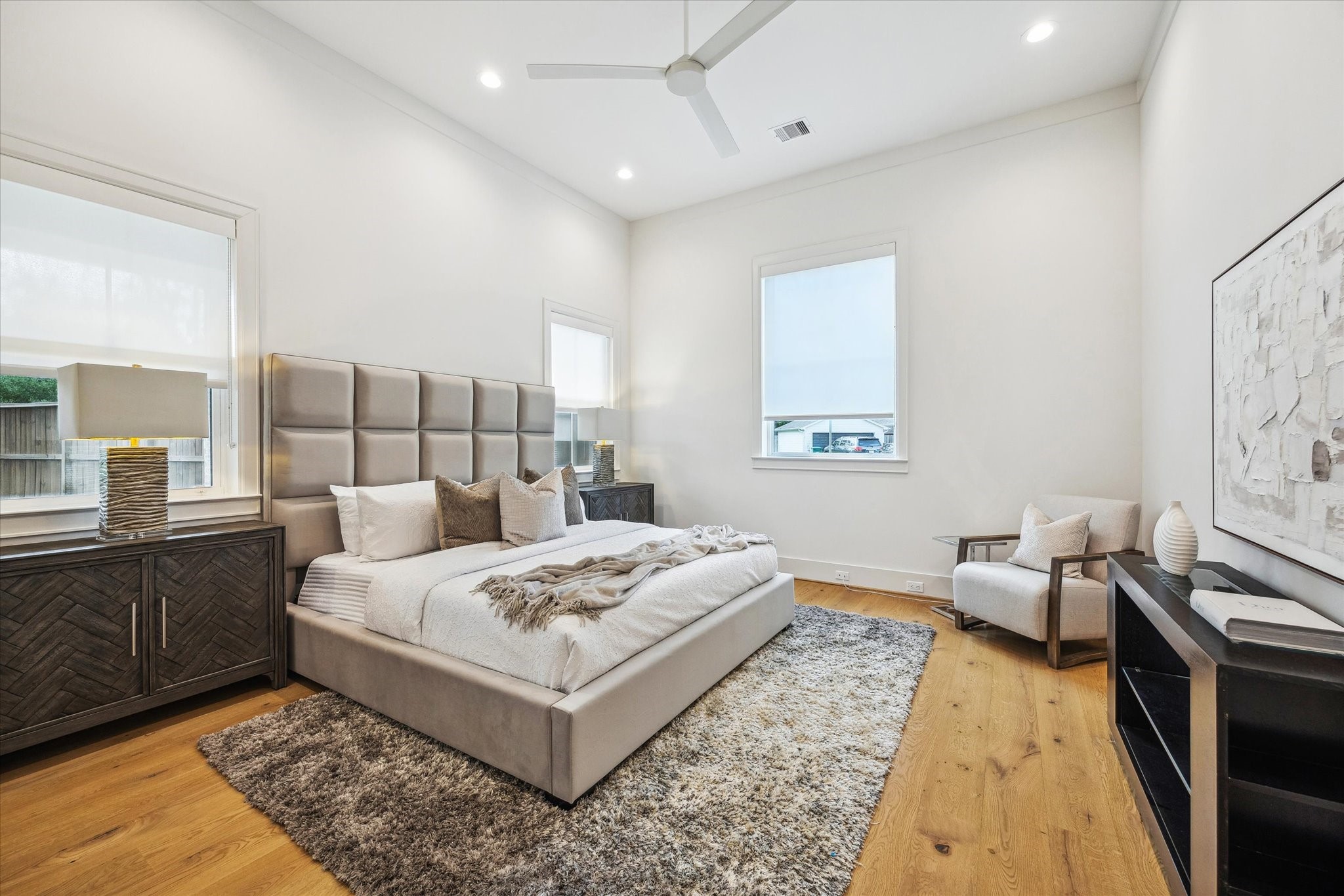 739 Azaleadell Drive Houston, TX 77018 - Photo 28 of 49 a bedroom with a bed and wooden floor