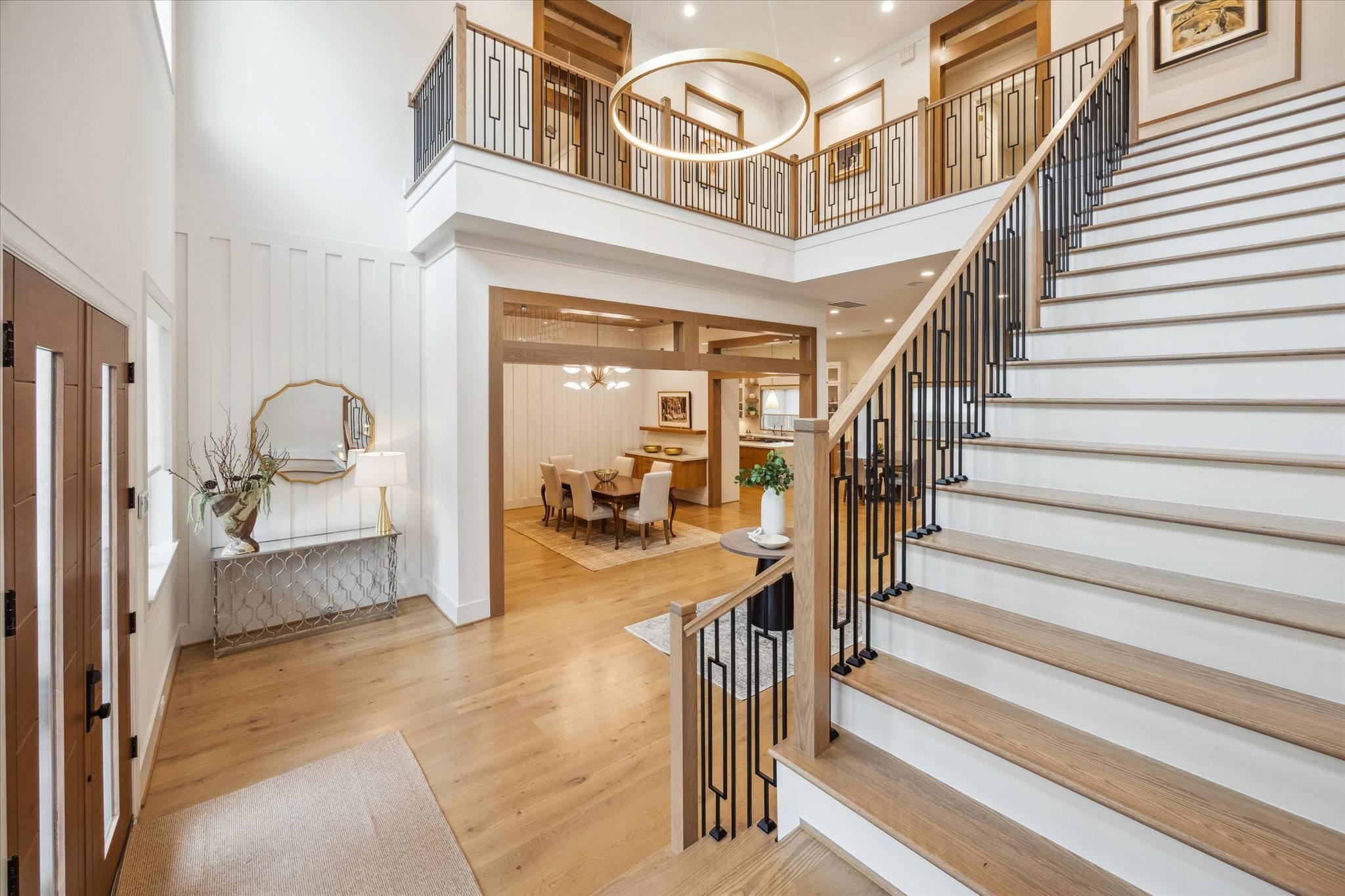 739 Azaleadell Drive Houston, TX 77018 - Photo 29 of 49 a view of a livingroom with wooden floor and a large window