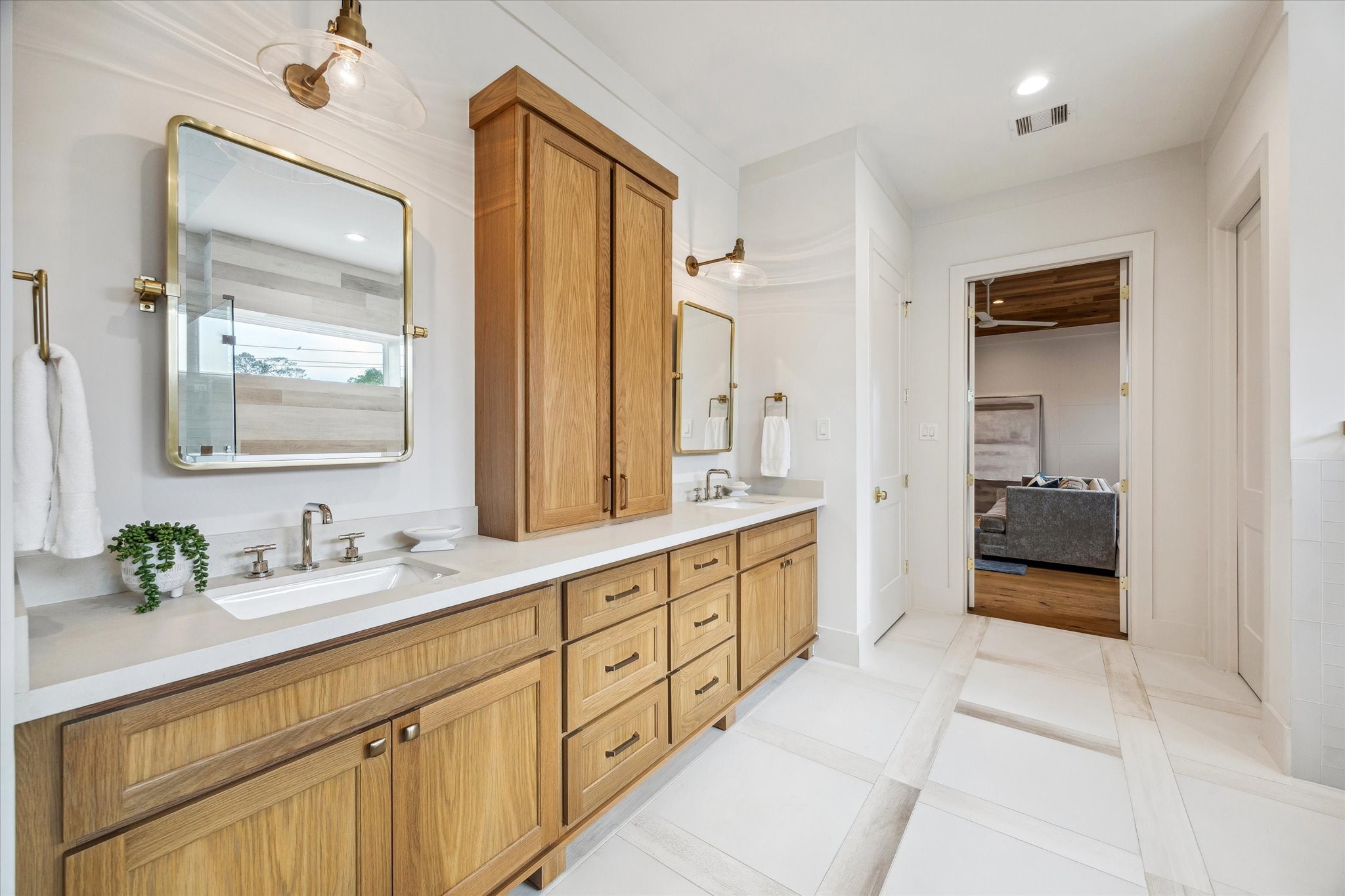 739 Azaleadell Drive Houston, TX 77018 - Photo 34 of 49 a spacious en suite bathroom with a double vanity sink and a mirror