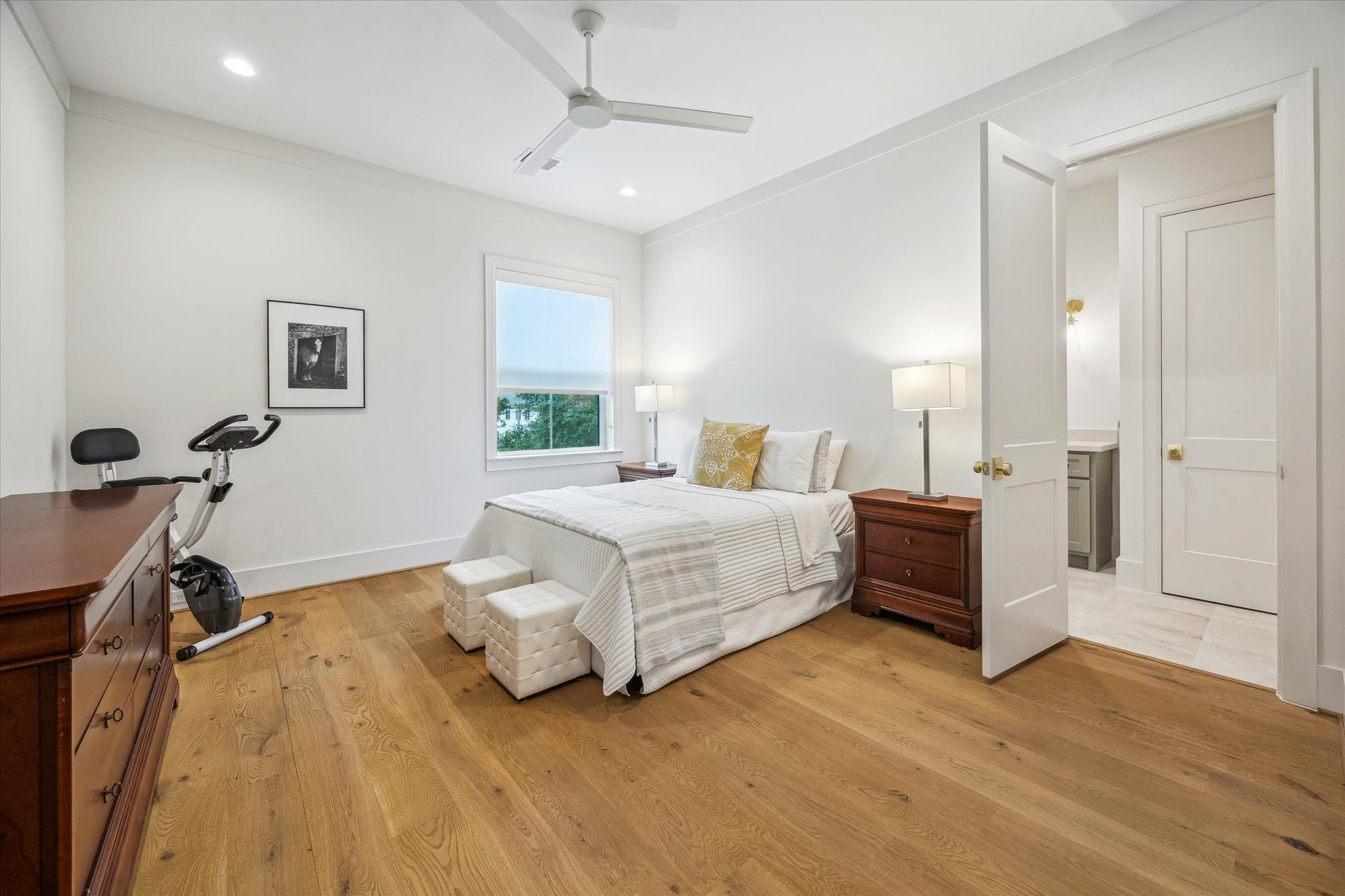 739 Azaleadell Drive Houston, TX 77018 - Photo 37 of 49 a bedroom with a bed and a table