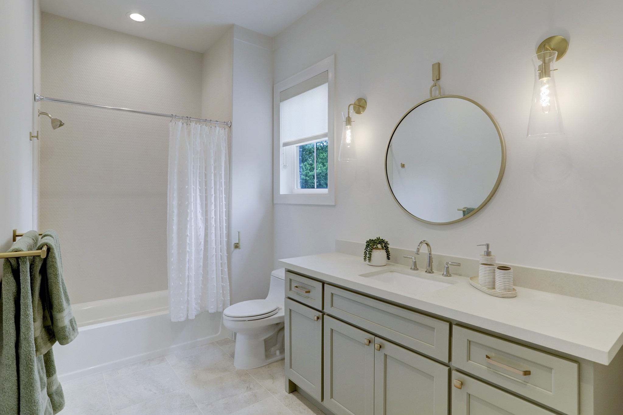 739 Azaleadell Drive Houston, TX 77018 - Photo 38 of 49 a bathroom with a toilet a sink a mirror and a shower