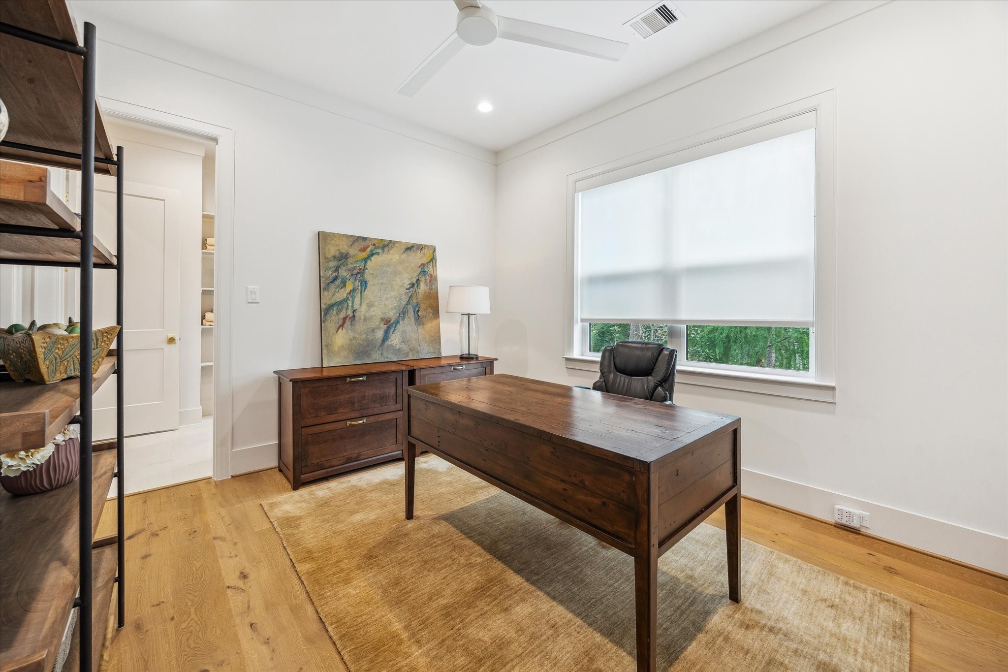 739 Azaleadell Drive Houston, TX 77018 - Photo 41 of 49 a living room with a bed furniture and a window