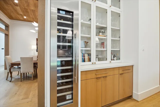 a view of a living room with windows