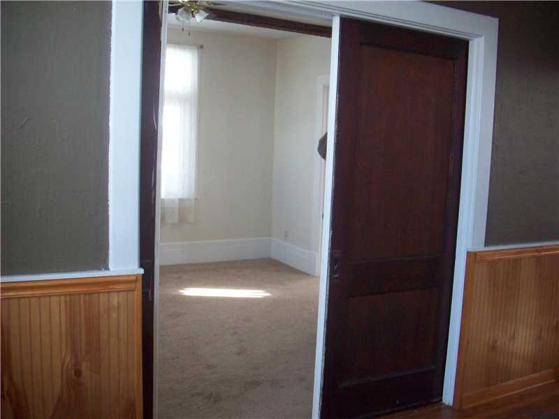 460 Irvin Avenue Rochester, PA 15074 - Photo 10 of 24 Living Room. View thru pocket door