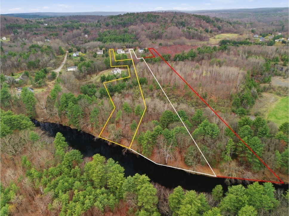 139 Nashua Road Pepperell, MA 01463 - Photo 2 of 6 an aerial view of residential houses with outdoor space and trees