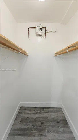 a view of a room with racks on the wall