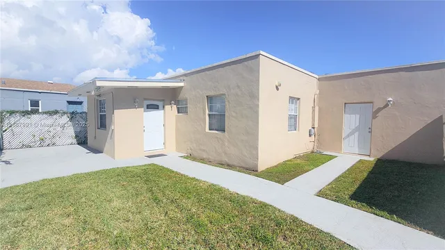 a spacious bathroom with a sink and a yard