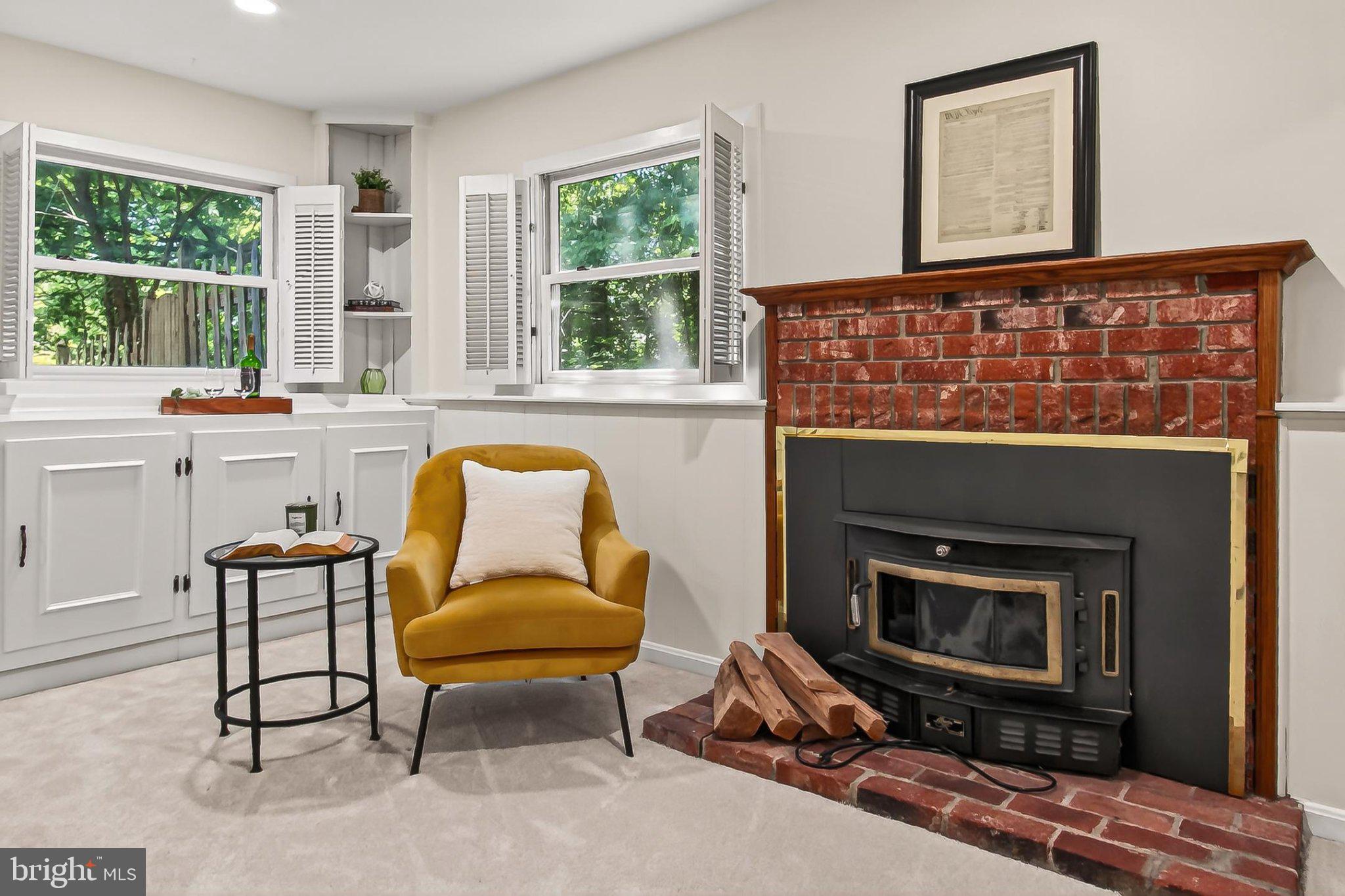 6908 Rochambeau Place Springfield, VA 22153 - Photo 34 of 70 Brick fireplace with wood stove insert