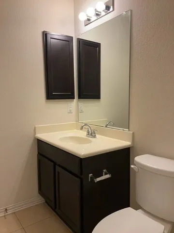 a bathroom with a sink and a toilet