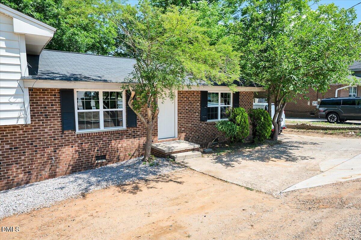 3408 Atlantic Avenue Raleigh, NC 27604 - Photo 3 of 48 a backyard of a house with seating space