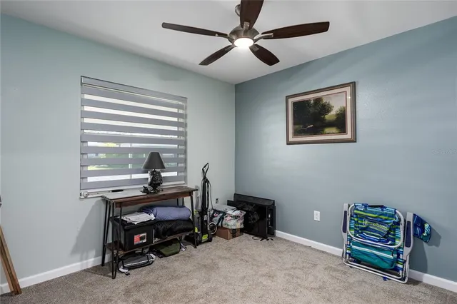 a view of a workspace with furniture