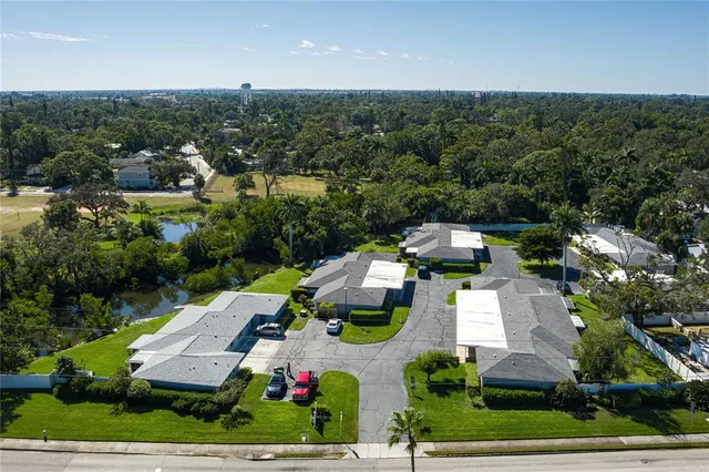 an aerial view of a house with a garden