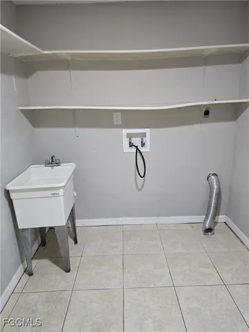 a bathroom with a toilet and a sink