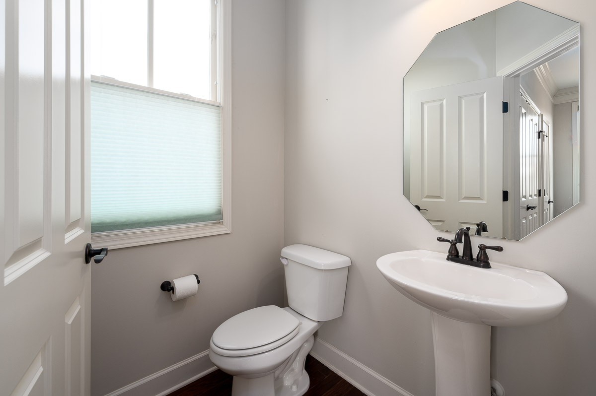2069 Rural Plains Circle Franklin, TN 37064 - Photo 18 of 34 a bathroom with a sink and a toilet