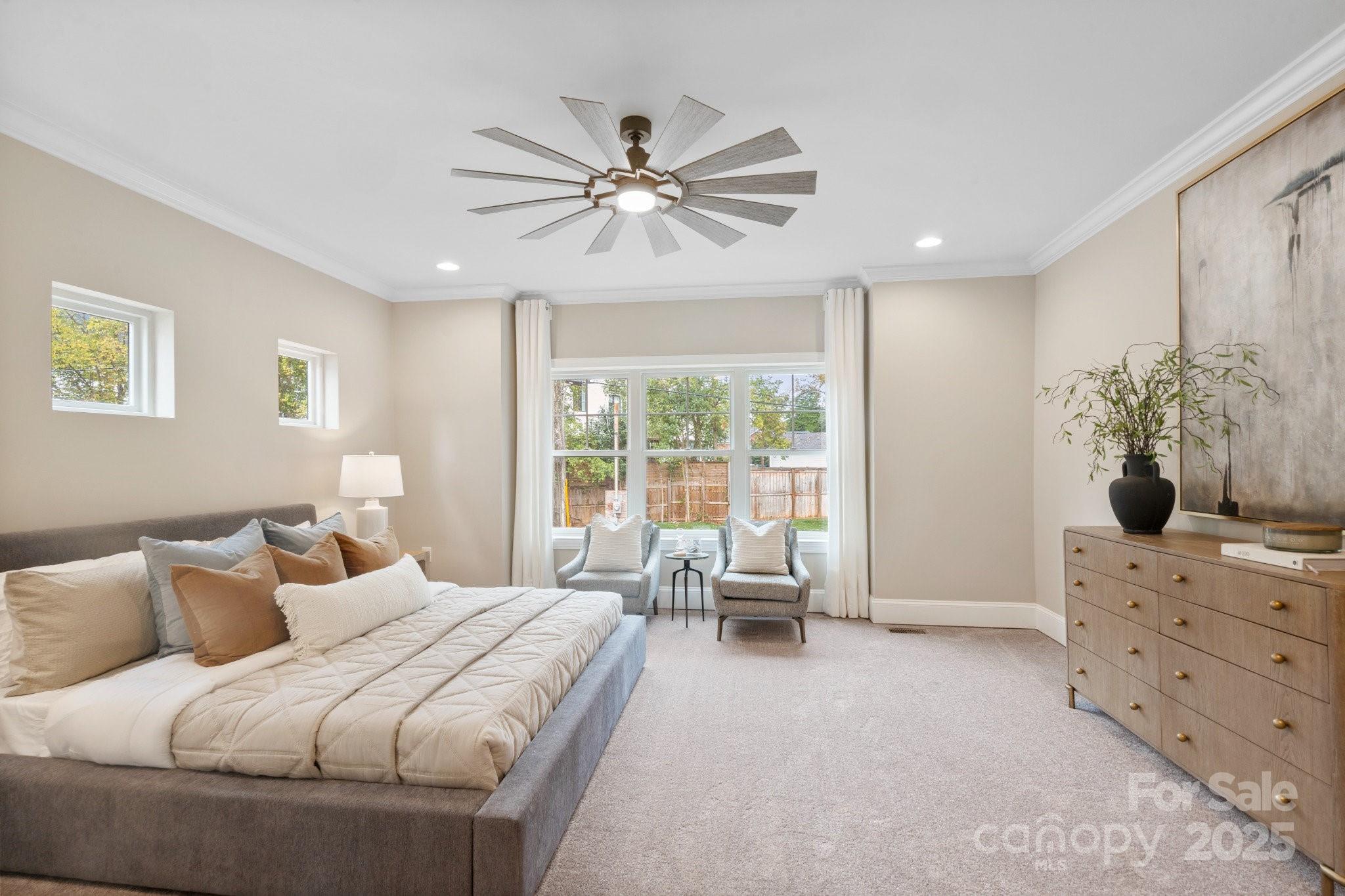 4023 Randolph Road Charlotte, NC 28211 - Photo 24 of 48 a bedroom with a large bed and a window