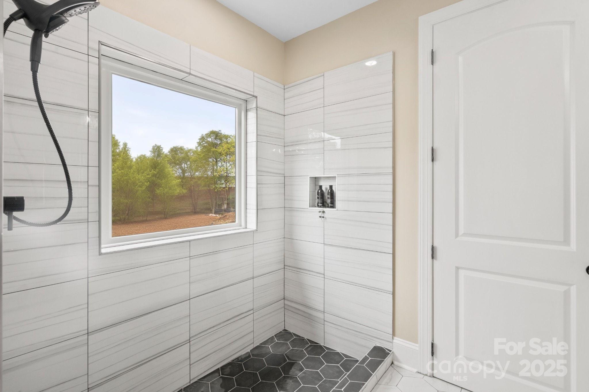 4023 Randolph Road Charlotte, NC 28211 - Photo 29 of 48 a bathroom with a window
