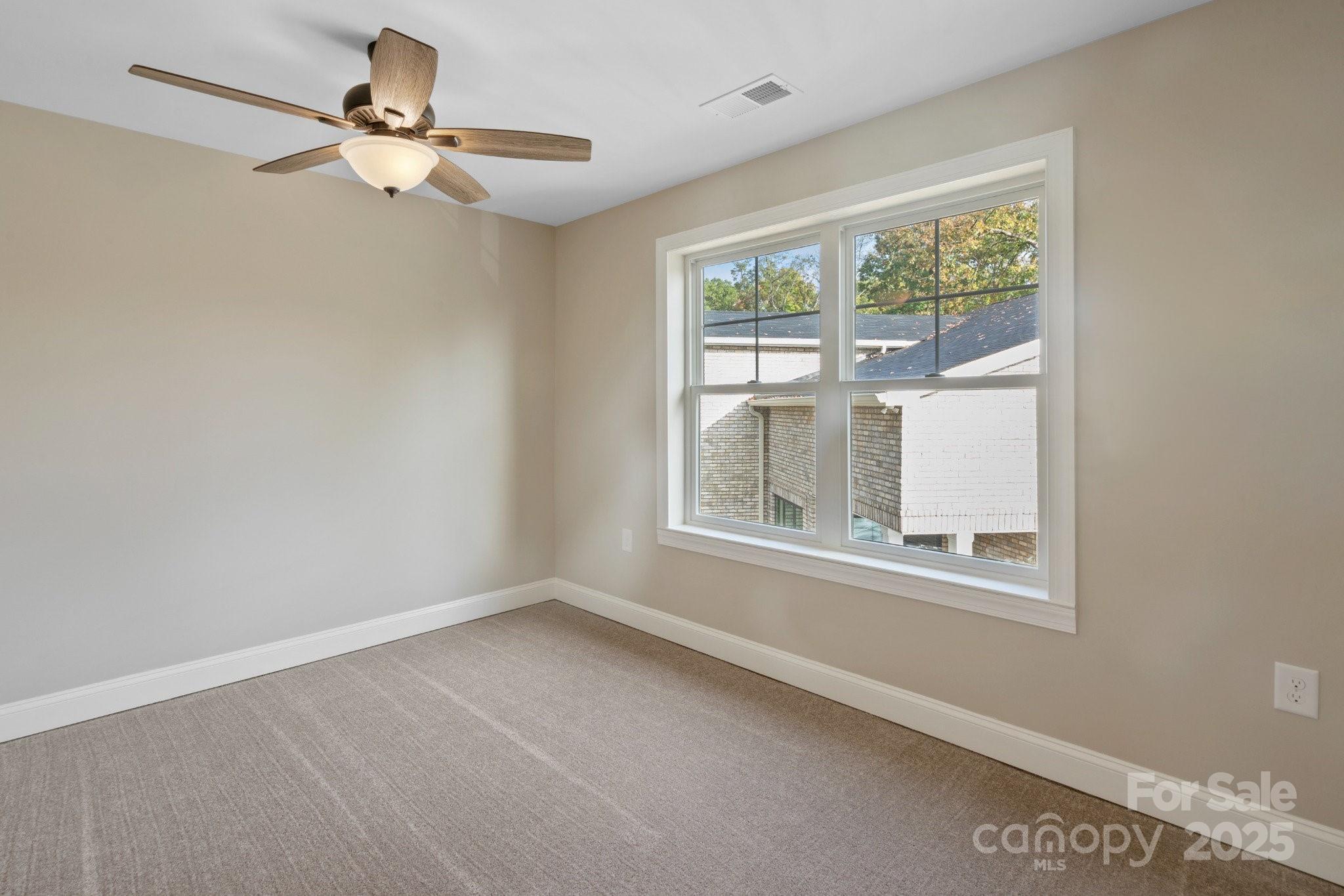 4023 Randolph Road Charlotte, NC 28211 - Photo 32 of 48 an empty room with a window