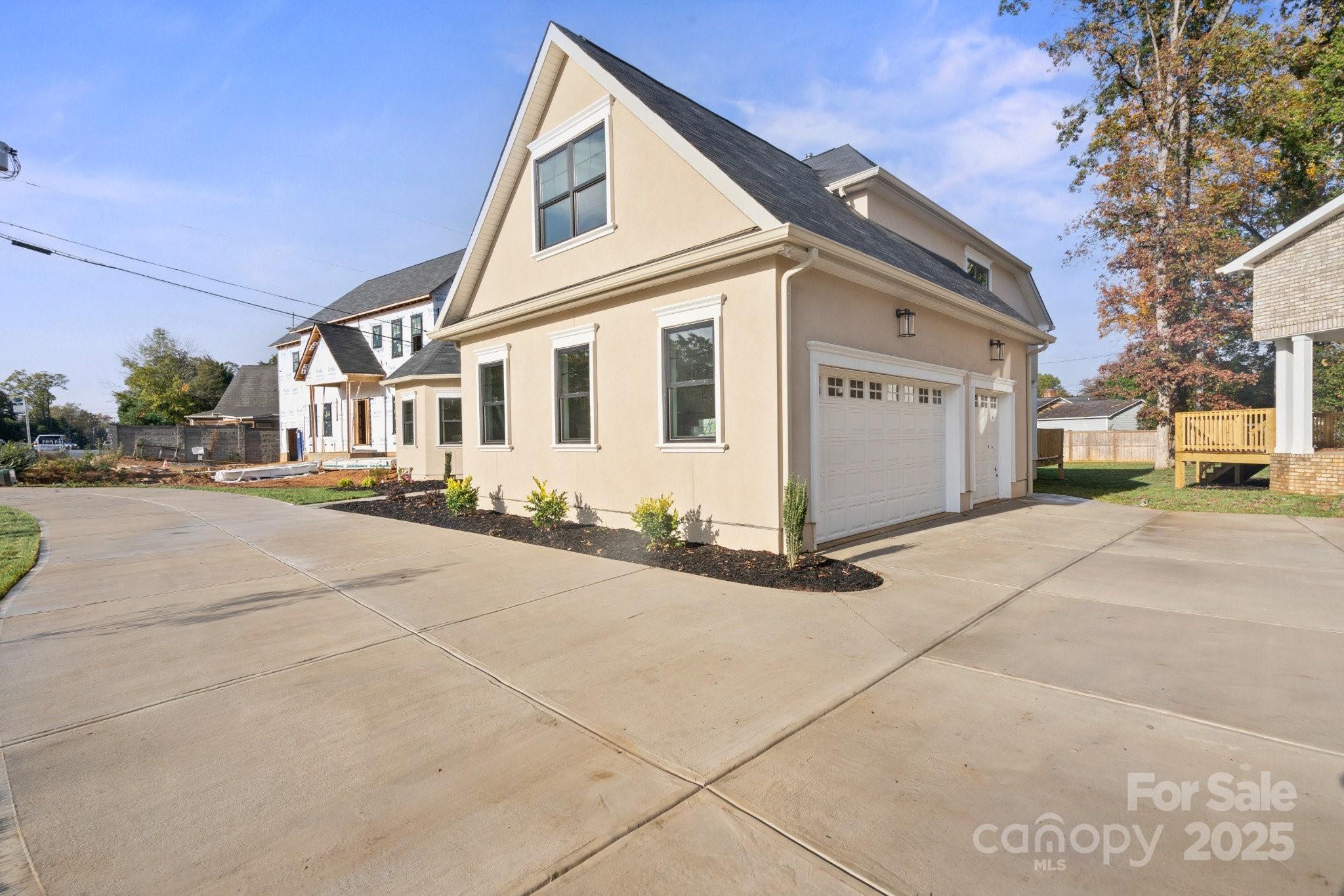 4023 Randolph Road Charlotte, NC 28211 - Photo 43 of 48 a view of a white house with a street
