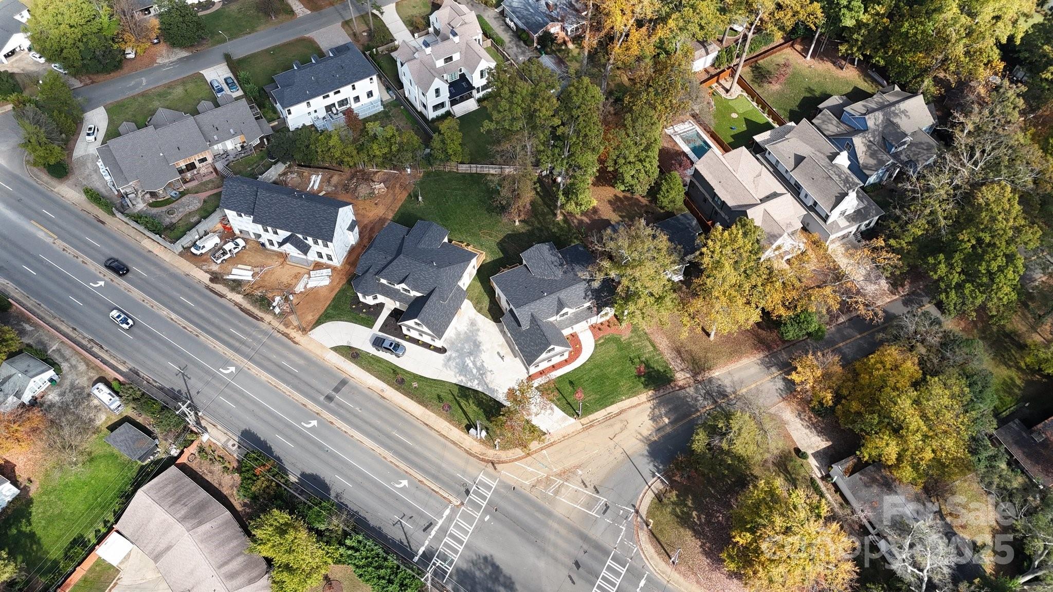 4023 Randolph Road Charlotte, NC 28211 - Photo 46 of 48 an aerial view of a house with a garden and trees