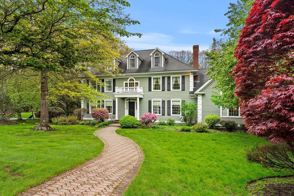 37 Old Planters Road Beverly, MA 01915 - Photo 2 of 42 a front view of a house with a garden