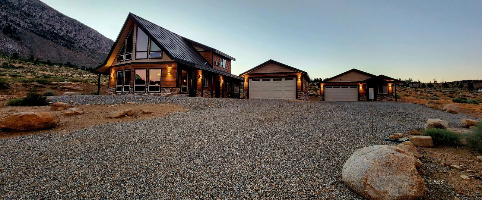 75 Ridgeview Bishop, CA 93514 - Photo 2 of 35 a front view of a house with a yard