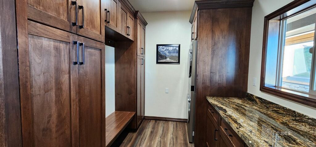 75 Ridgeview Bishop, CA 93514 - Photo 27 of 35 a view of a hallway with wooden floor and staircase