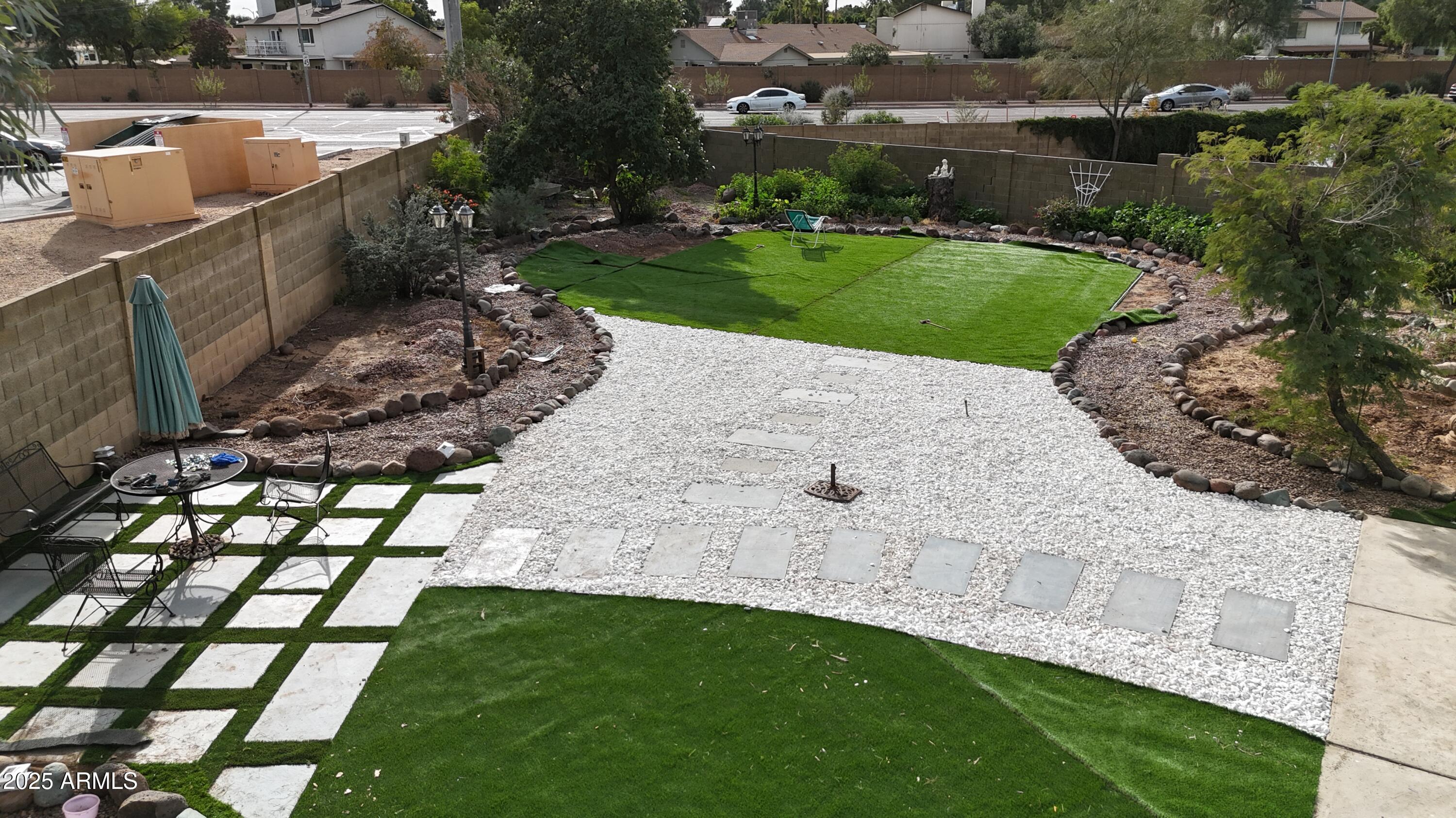 4401 West McRae Way Glendale, AZ 85308 - Photo 21 of 30 a view of a garden with an buildings