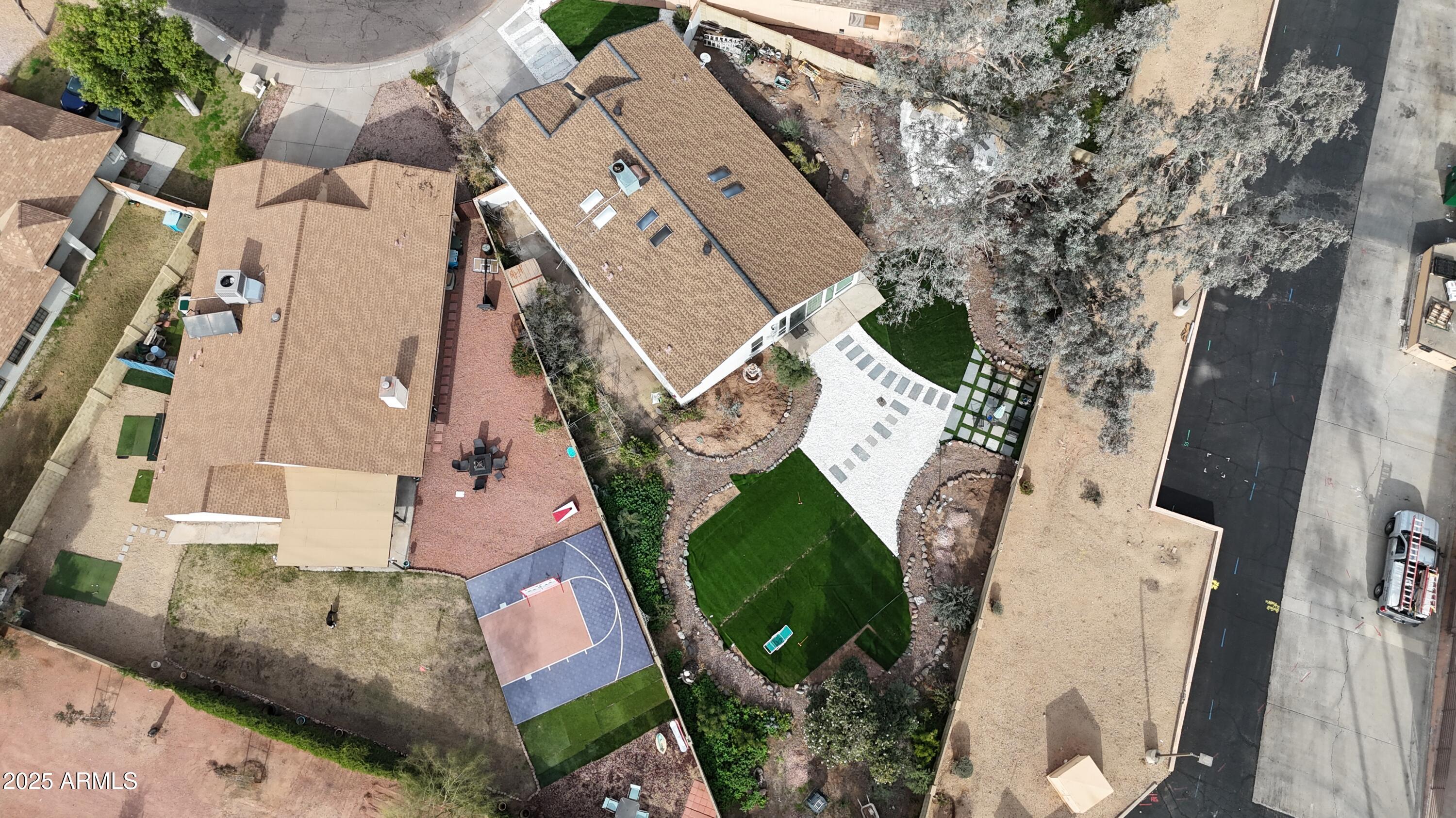 4401 West McRae Way Glendale, AZ 85308 - Photo 26 of 30 an aerial view of residential houses with outdoor space