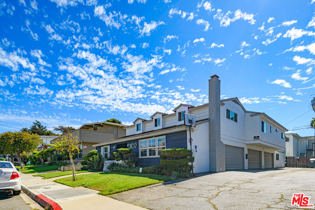 1102 Barbara Street Redondo Beach, CA 90277 - Photo 3 of 13 a front view of a house with a yard