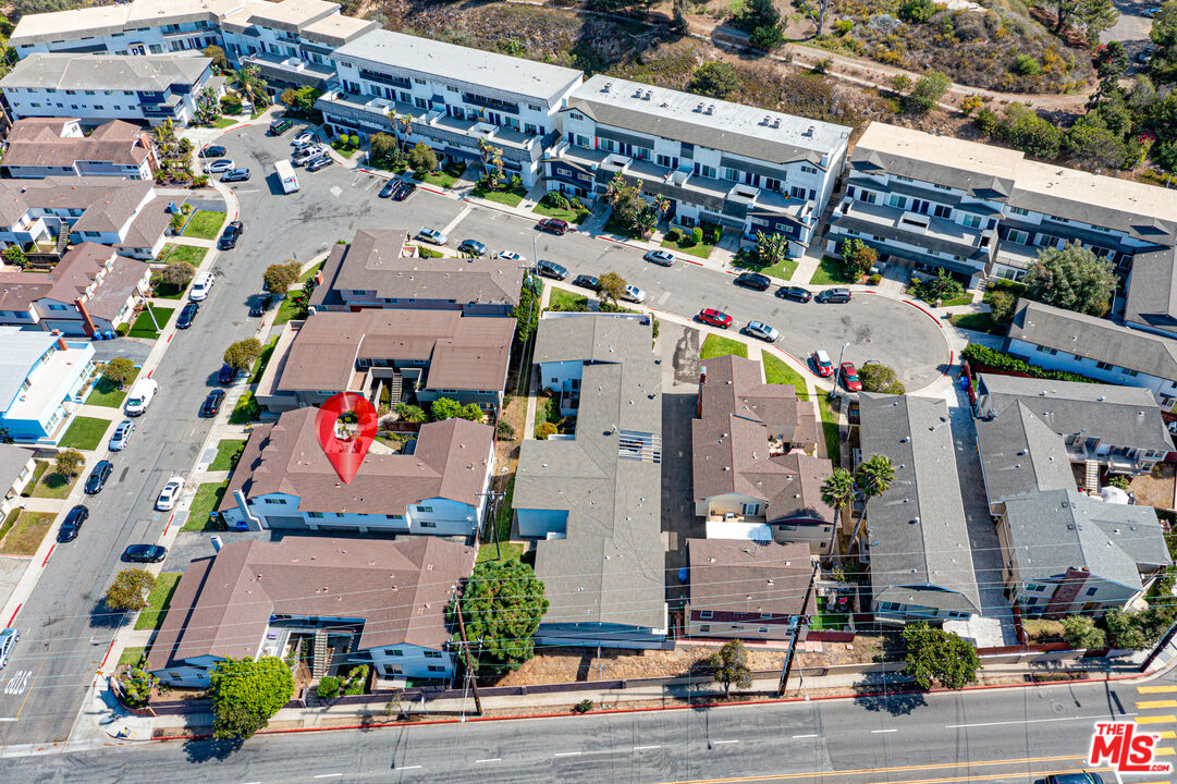 1102 Barbara Street Redondo Beach, CA 90277 - Photo 6 of 13 a picture of houses with street