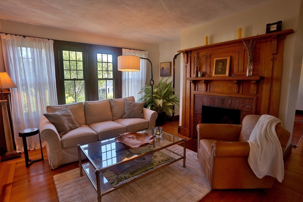 4 Willow Avenue, Unit 2 Salem, MA 01970 - Photo 17 of 41 a living room with furniture fireplace and a window